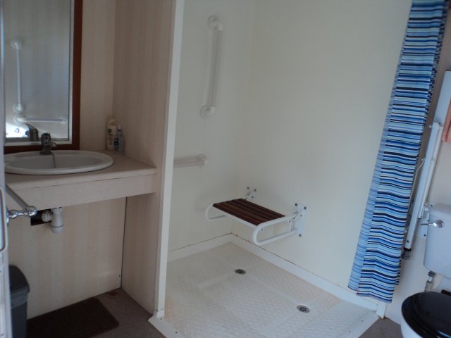 Accessible bathroom with grab rails